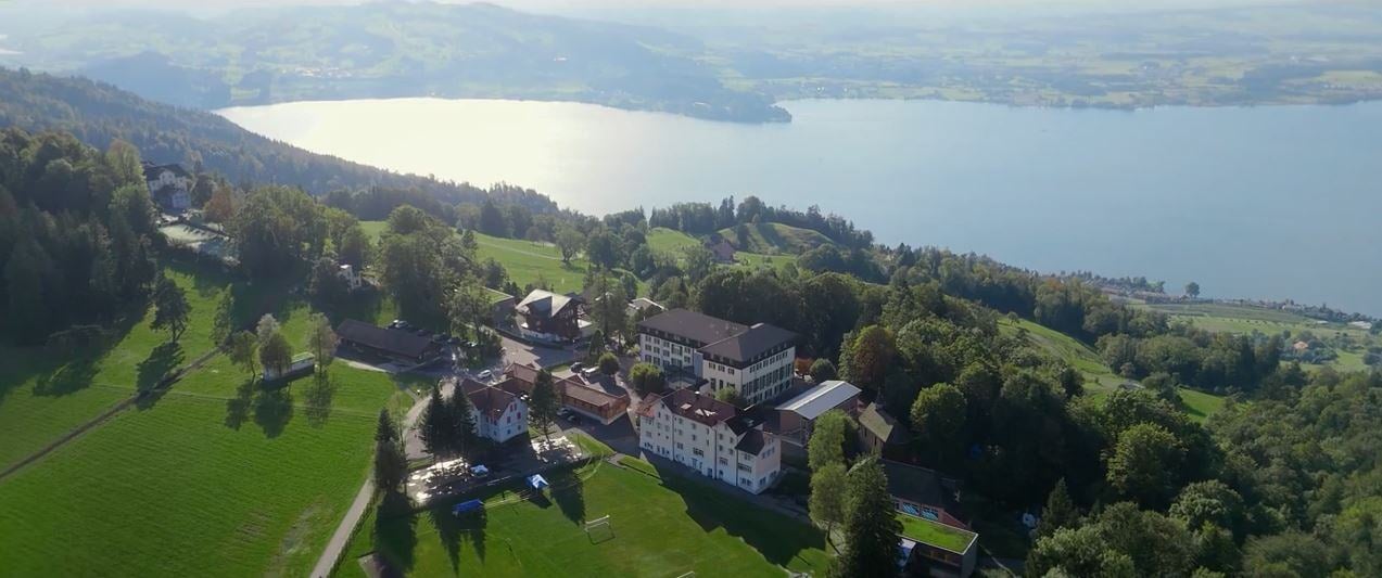 Institut Montana from above with lake of Zug seen nearby.